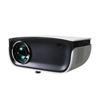 Devanti mini projector showing power button and USB port on the side.