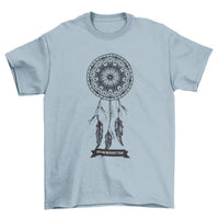 Close-up of dream catcher design with feathers and beads on turquoise T-shirt