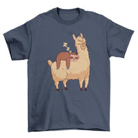 T-shirt with illustration of a sleeping sloth riding a llama against white background.