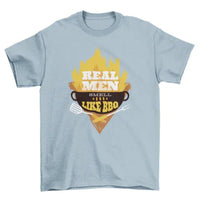 Close-up of front of black T-shirt showing BBQ grill with flames and bold white lettering.