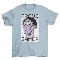 Folded Proud Gamer T-shirt displaying graphic of man with controller sunglasses and bold 'Proud Gamer' lettering