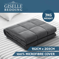 7KG weighted blanket spread over a bed showing textured fabric surface.