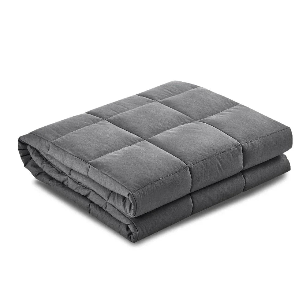 9kg weighted blanket folded on white background showcasing soft microfibre cover texture