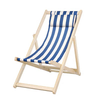 Blue and white striped folding beach chair with wooden frame on white background