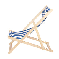 Beach chair displayed in reclining position showing adjustable backrest