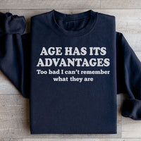 Black sweatshirt with "Age Has Its Advantages" text design in white and orange.