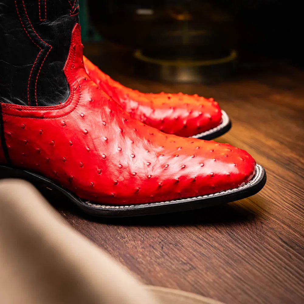 Side view of Alabama Red boot displaying red leather interior lining and detailed stitching.