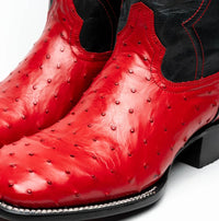 Angle showing detailed texture and craftsmanship of the Alabama Red ostrich cowboy boot.