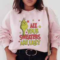 Light pink sweatshirt featuring the text 'All Your Sweaters Are Ugly' in dark letters