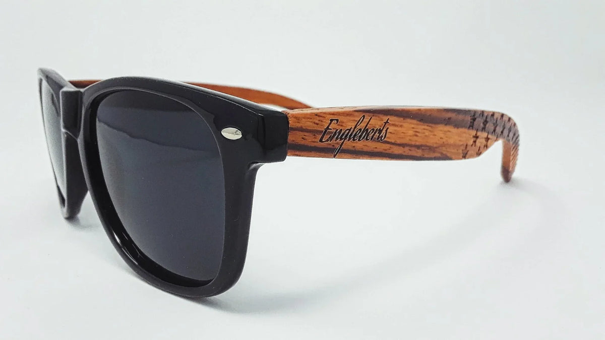 Pair of Zebrawood sunglasses displayed side by side on a white surface.