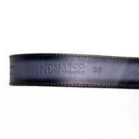 Flat lay of ARKANSAS python skin belt coiled to display genuine python texture and antique buckle.