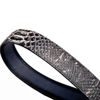 Close-up showing detailed python skin scales on the ARKANSAS belt with engraved western-style buckle.