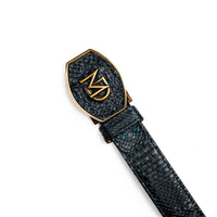 Side view of Arkansas python skin belt showing black and blue textured scales and polished brass buckle