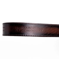 Shot focusing on the detailed python scale pattern of the brown belt