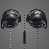 Cable and microphone close-up demonstrating inline control on black ear hook headphones.