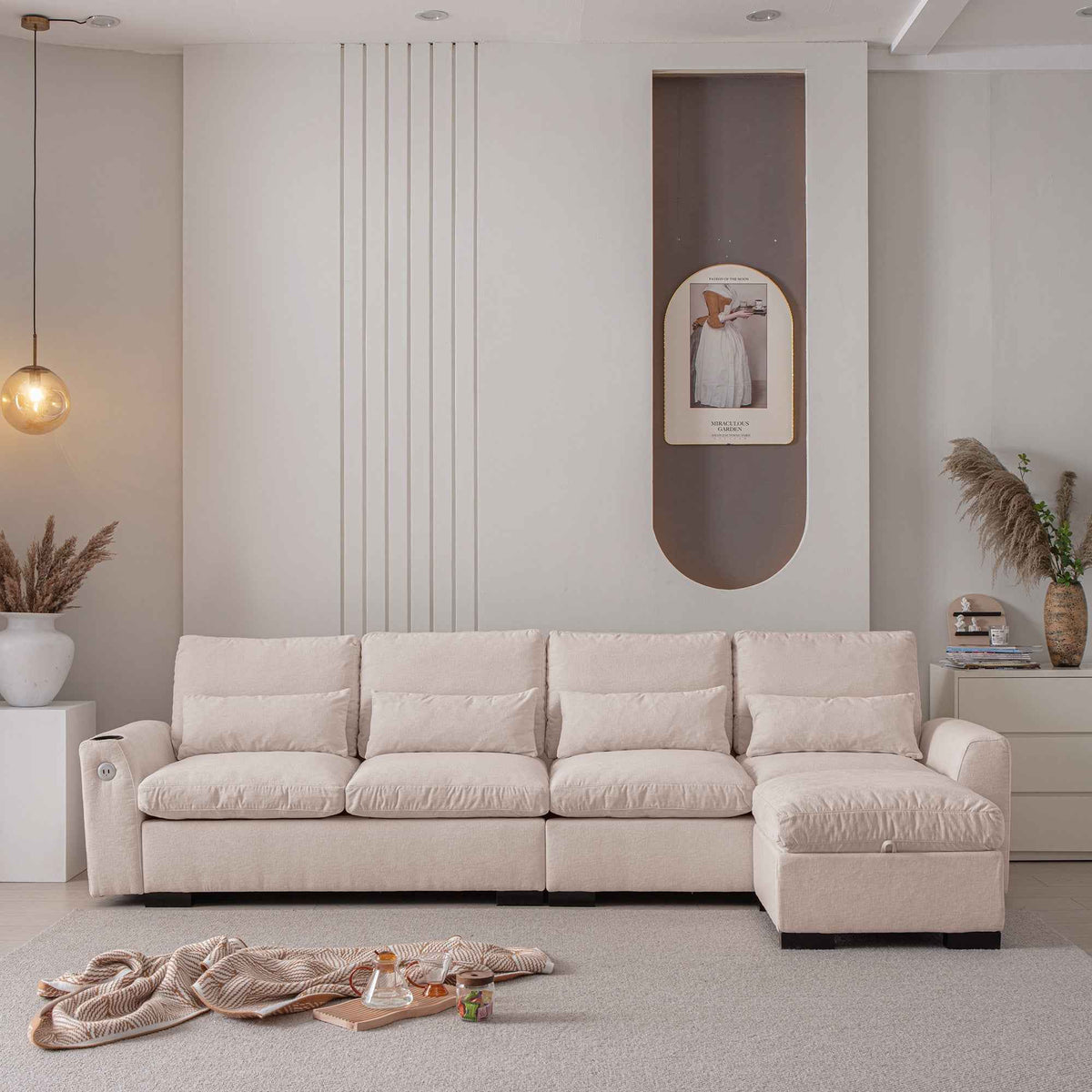 Beige L-shaped modular sofa with chenille upholstery and a reversible ottoman in a modern living room setting.