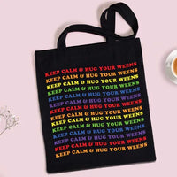 Keep Calm Wiener Dog Tote bag with red straps laid flat highlighting bright dog print on fabric.