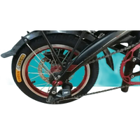 Electric bike rear wheel with black CST tire and visible drivetrain components.