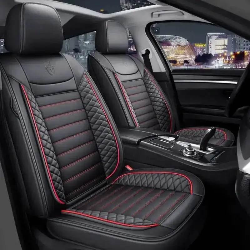 Interior car shot focusing on black leather car seat cover and matching interior accents.