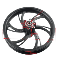 Black motorcycle wheel for electric scooters displayed flat, emphasizing the tire and rim design.