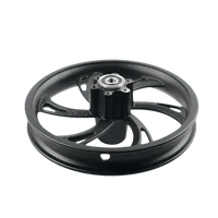Close-up detail of black motorcycle wheel rim and hub for electric scooters against white background.