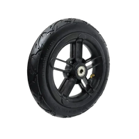 Close-up of black rubber scooter tire highlighting durable tread pattern and texture.