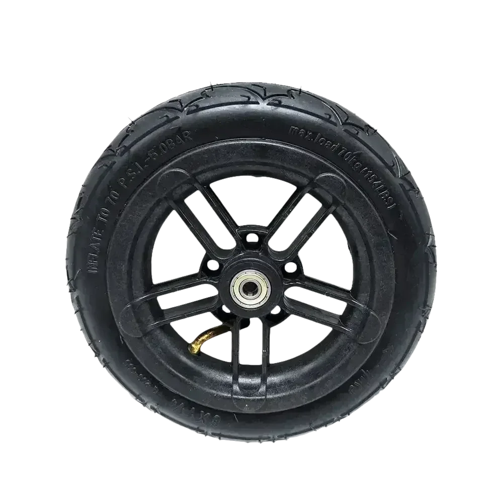 Pneumatic wheel with black tire mounted on folding electric scooter rim.