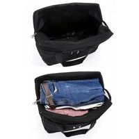 Foldable black luggage bag fully zipped with wheels showing portability and compactness.