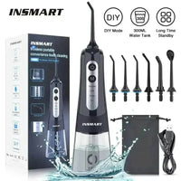 Black USB rechargeable dental water flosser angled to show slim handheld design and nozzle tip.