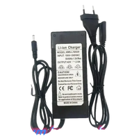 Black 42V charger for e-bike battery alongside blue 36V 14Ah lithium-ion battery pack.
