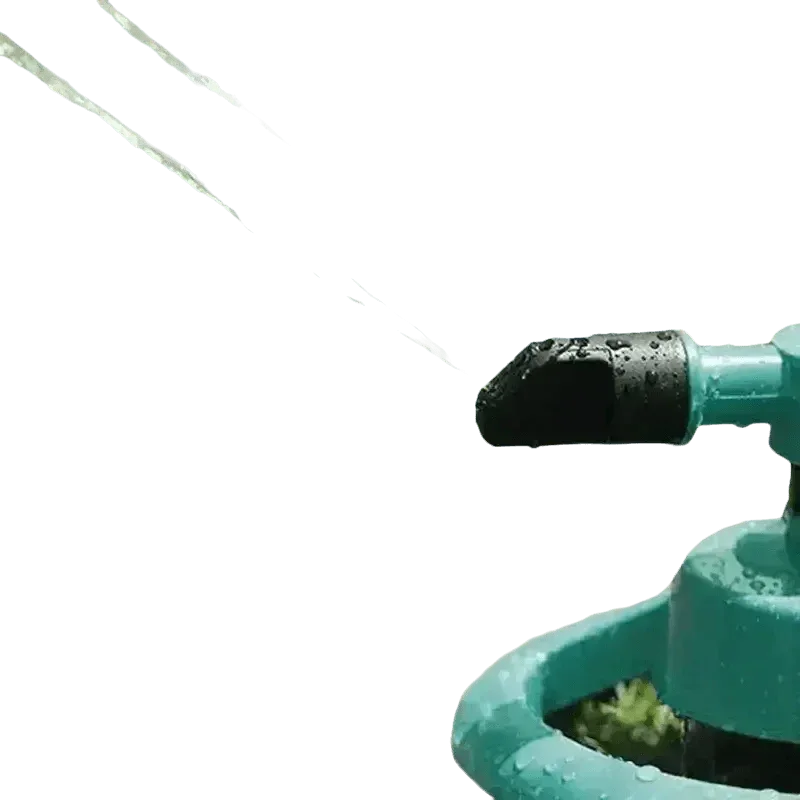 Blue rotating garden sprinkler working to evenly water grassy yard.