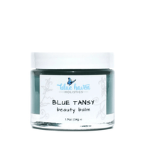 Blue Tansy Serenity Balm jar with botanical illustrations on label and blue accents