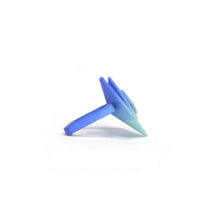 Blue Aquamarine colored Geometric Cocktail Ring displayed on light background.
