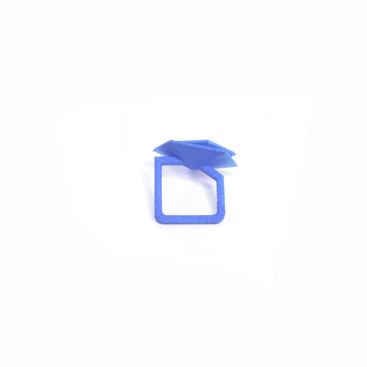 Top angle of blue aquamarine Geometric Cocktail Ring showing smooth gradient hues.