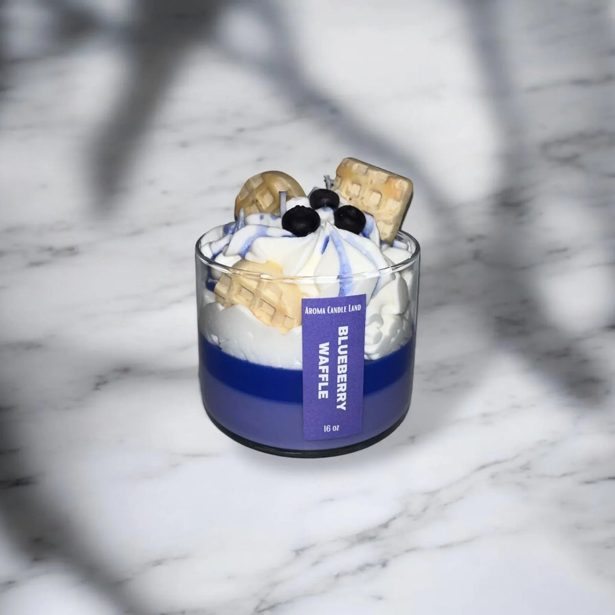Blueberry Waffle scented candle packaged as a gift with fresh blueberries decor.