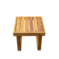 Detail image focusing on craftsmanship of lounge set's acacia wood and cushions