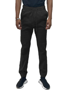 Front view of black solid jogger pants featuring elastic waistband and standard pockets.