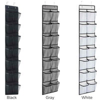 White over-the-door shoe organizer with 14 clear pockets holding various shoes in a tidy row on a closet door.