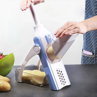 Vegetable and fruit chopper with safety locking mechanism and removable parts for cleaning.