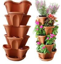Five-tiered white stacking planters displayed with assorted green plants and flowers outdoors.