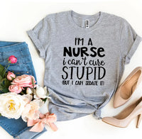Close-up of white bold text printed on black T-shirt saying 'I’m a Nurse I Can’t Cure Stupid'.