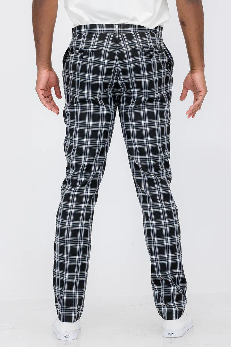 Back view of plaid slim fit trouser pants showing two back pockets with button closures.