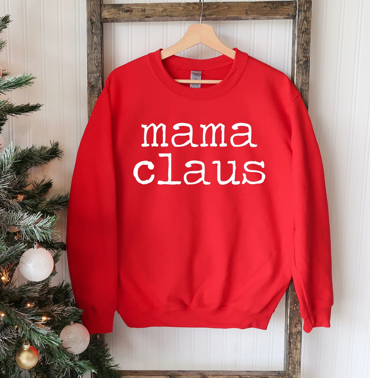 Close-up of soft fabric texture and stitching on the Mama Claus Christmas sweatshirt collar.