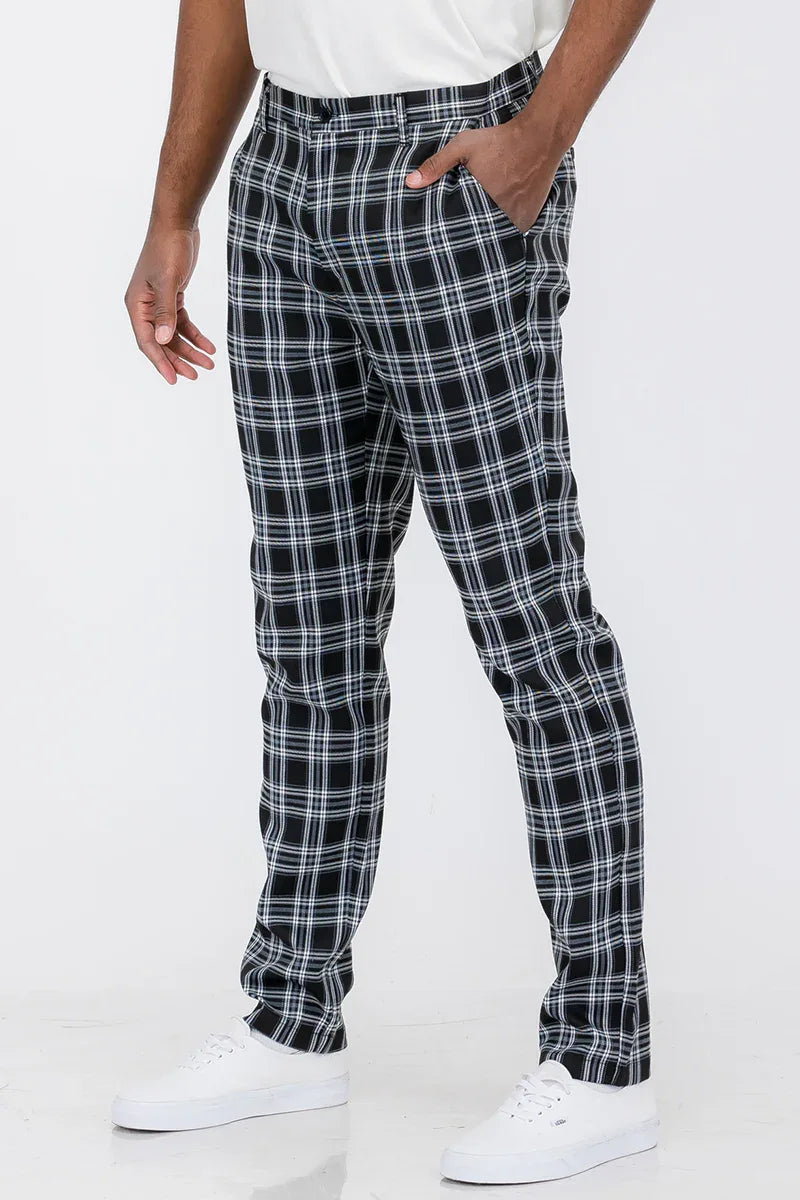 Front view of plaid slim fit trouser pants on a male model, showing button fly and slim cut.