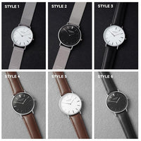 Engraving detail showing personalized handwritten message on stainless steel back of watch.