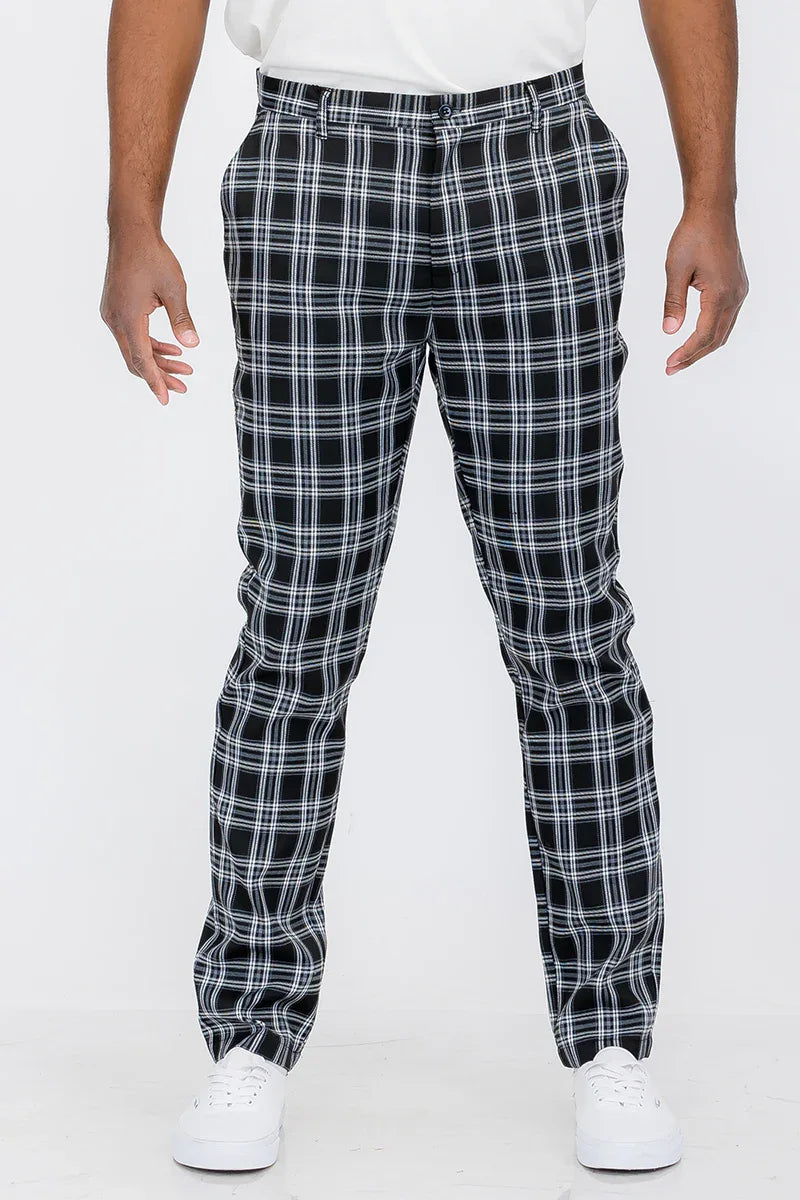 Close-up of plaid slim fit trouser pants fabric texture and button fly closure details.