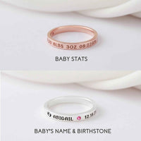 Elegant silver band ring with intricate baby name engraving, a perfect gift for first-time mothers.