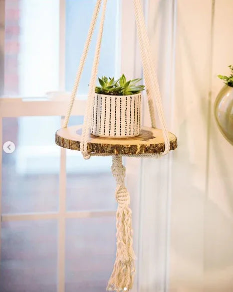 Scale diagram showing dimensions of macrame plant hanger with 45 inch length and 12 inch wooden tray.