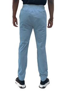 Close-up of jogger pants fabric texture highlighting cotton and elastane blend material.