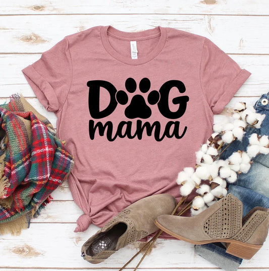 Front view of white Dog Mama T-shirt with black lettering, laid flat on a neutral background.